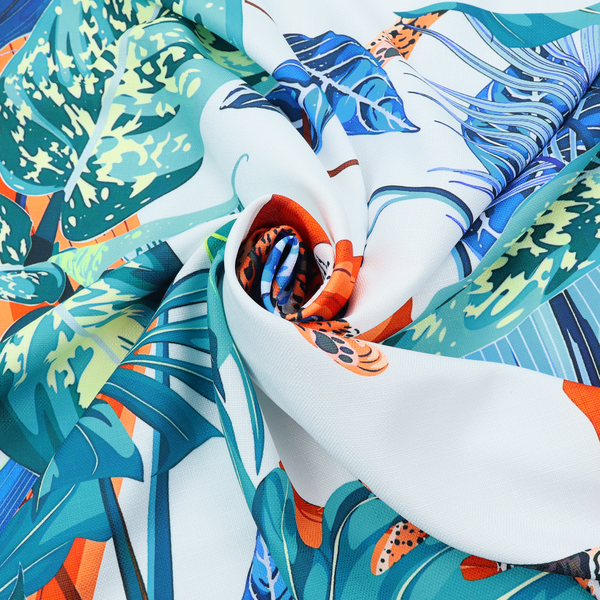 Pattern fabric featuring leopards resting on orange branches amidst vibrant blue and turquoise tropical leaves and foliage against a light background.