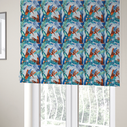 The fabric used to create these Roman blinds has leopards resting on orange branches amidst vibrant blue and turquoise tropical leaves and foliage against a light background.