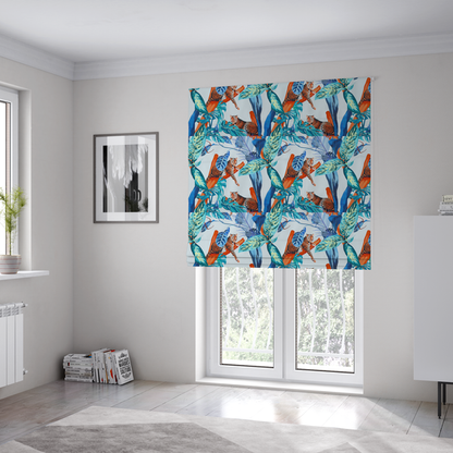 The fabric used to create these Roman blinds has leopards resting on orange branches amidst vibrant blue and turquoise tropical leaves and foliage against a light background.