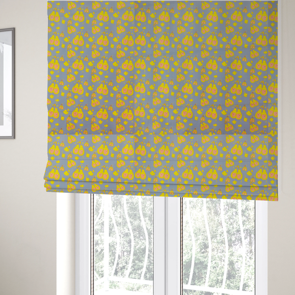 The fabric used to create these Roman blinds is a repeating pattern of paired, smiling yellow pears with pink heart-shaped centres on a light blue-grey herringbone background.