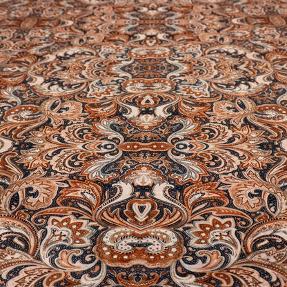 A dense, intricate, and ornate paisley and damask-style repeating pattern featuring rich earth tones of copper, brown, cream, and dark charcoal.