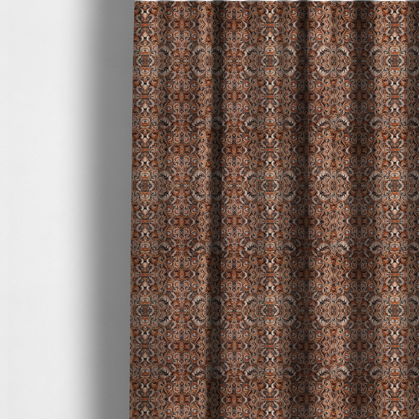 The fabric used to create these made-to-measure curtains is a dense, intricate, and ornate paisley and damask-style repeating pattern featuring rich earth tones of copper, brown, cream, and dark charcoal.