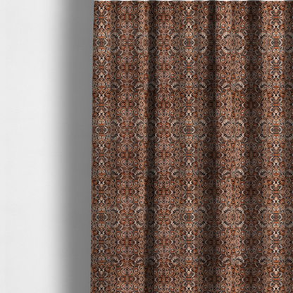 The fabric used to create these made-to-measure curtains is a dense, intricate, and ornate paisley and damask-style repeating pattern featuring rich earth tones of copper, brown, cream, and dark charcoal.