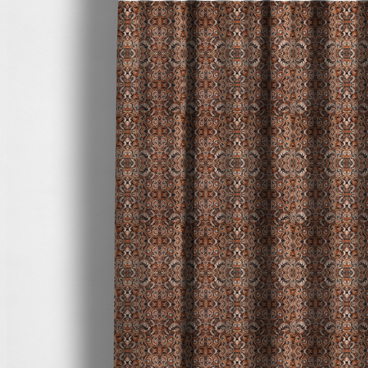 The fabric used to create these made-to-measure curtains is a dense, intricate, and ornate paisley and damask-style repeating pattern featuring rich earth tones of copper, brown, cream, and dark charcoal.