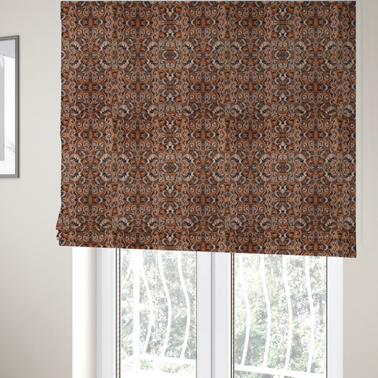 The fabric used to create these Roman blinds is a dense, intricate, and ornate paisley and damask-style repeating pattern featuring rich earth tones of copper, brown, cream, and dark charcoal.