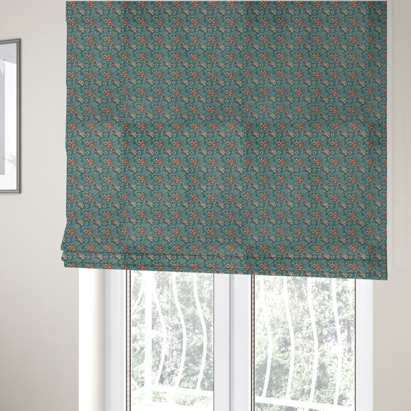 The fabric used to create these Roman blinds is a dense, vintage-style floral repeating pattern featuring peach and muted white flowers with detailed leaves and foliage against a vibrant teal background.