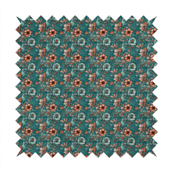 A dense, intricate, vintage-style botanical repeating pattern featuring small orange and pale grey-blue flowers with detailed foliage set against a dark teal background.