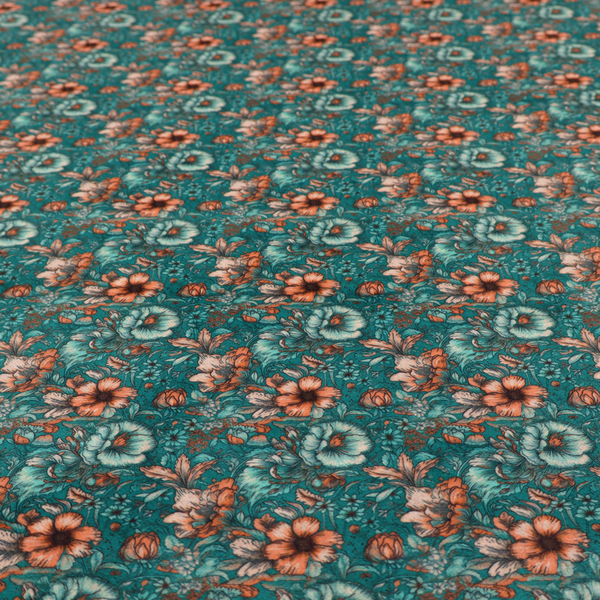 A dense, intricate, vintage-style botanical repeating pattern featuring small orange and pale grey-blue flowers with detailed foliage set against a dark teal background.