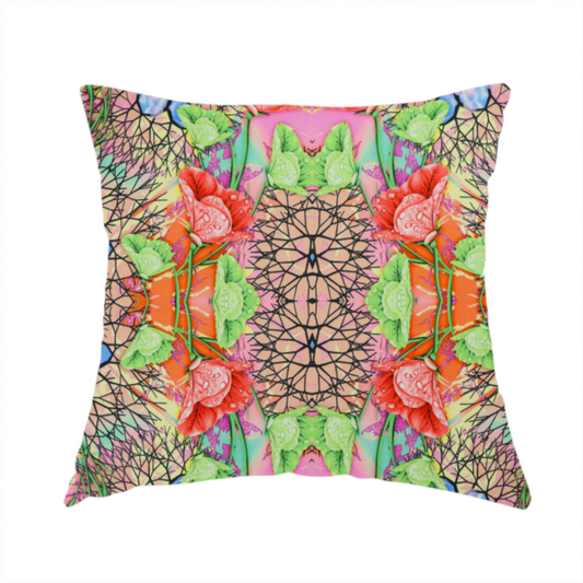 the fabric used to create this handmade cushion is a vibrant, psychedelic, and symmetrical kaleidoscopic pattern featuring red poppies, green leaves, water droplets, and intricate black geometric and branching web-like motifs over a multi-coloured pastel and neon background.