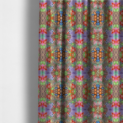 The fabric used to create these made-to-measure curtains is a vibrant, psychedelic, and symmetrical kaleidoscopic pattern featuring red poppies, green leaves, water droplets, and intricate black geometric and branching web-like motifs over a multi-coloured pastel and neon background.