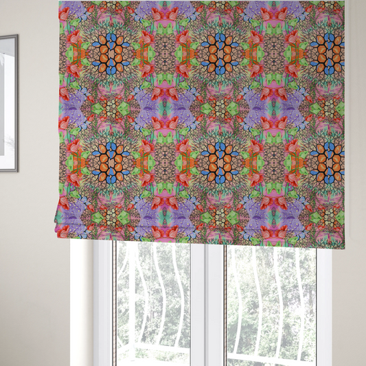 The fabric used to create these Roman blinds is a vibrant, psychedelic, and symmetrical kaleidoscopic pattern featuring red poppies, green leaves, water droplets, and intricate black geometric and branching web-like motifs over a multi-coloured pastel and neon background.
