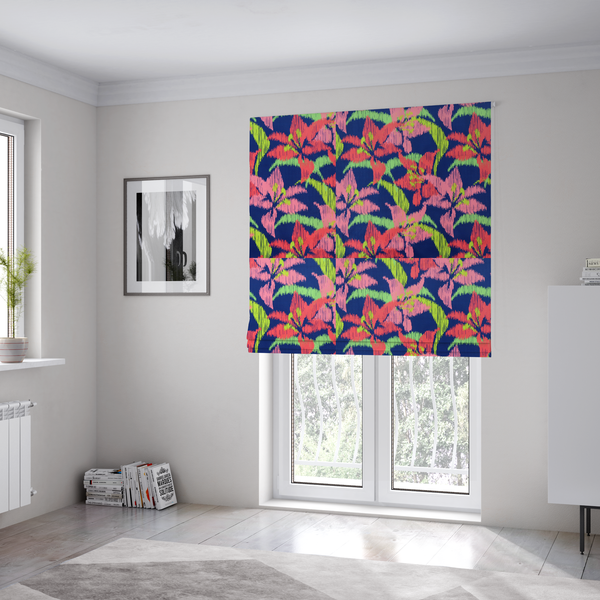 The fabric used to create these Roman blinds is a vibrant fabric pattern featuring large coral and light pink lily flowers with bright lime green leaves against a solid royal blue background.