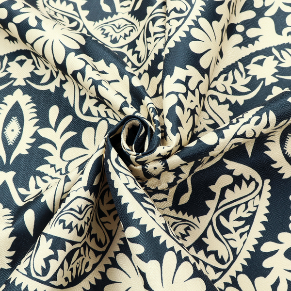A dark midnight blue fabric featuring an ornate, repeating damask pattern in creamy off-white, composed of intricate scrollwork, floral motifs, and symmetrical ogee shapes.
