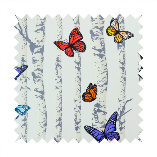 A light-coloured fabric featuring a pattern of vertical grey and white birch tree trunks interspersed with colourful butterflies in shades of red, orange, yellow, blue, and purple.