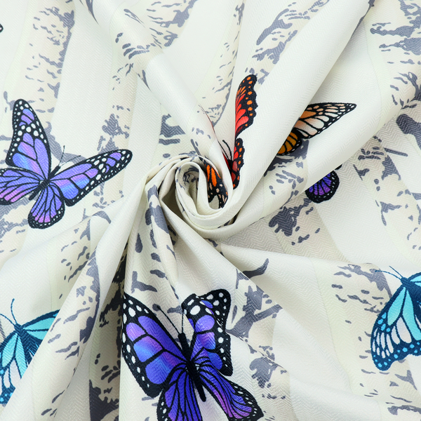 A light-coloured fabric featuring a pattern of vertical grey and white birch tree trunks interspersed with colourful butterflies in shades of red, orange, yellow, blue, and purple.