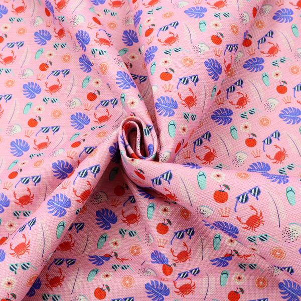 Pink summer-themed fabric featuring a repeating pattern of tropical icons including crabs, sunglasses, cherries, flip-flops, palm leaves, citrus slices, and flowers.
