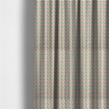 The fabric used to create these made-to-measure curtains is a light background summer-themed fabric featuring a repeating pattern of tropical icons including palm trees, suns, swim trunks, and abstract shapes.