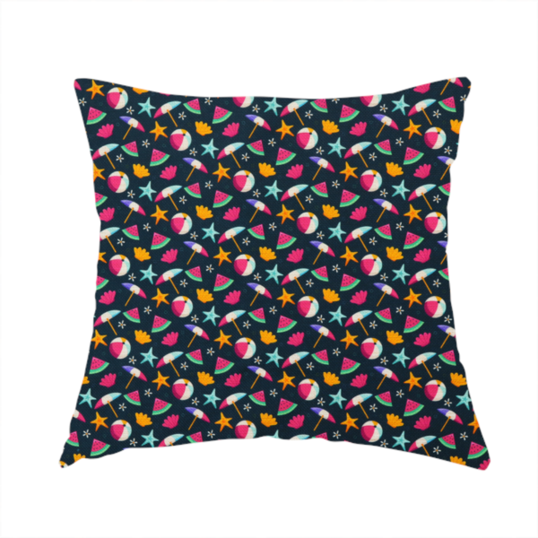 The fabric used to create this handmade cushion is a dark blue summer-themed fabric featuring a repeating pattern of tropical icons including beach balls, parasols, watermelon slices, starfish, seashells, and flowers.