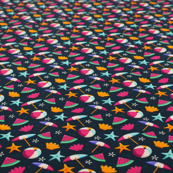 Dark blue summer-themed fabric featuring a repeating pattern of tropical icons including beach balls, parasols, watermelon slices, starfish, seashells, and flowers.
