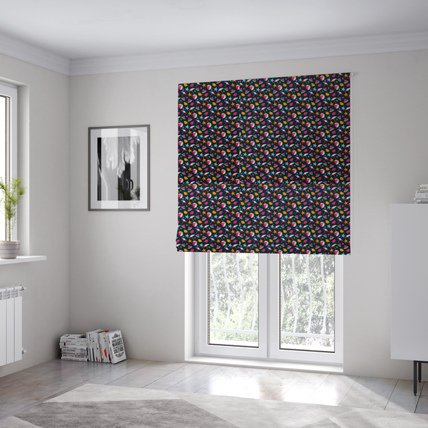The fabric used to create these Roman blinds is a dark blue summer-themed fabric featuring a repeating pattern of tropical icons including beach balls, parasols, watermelon slices, starfish, seashells, and flowers.
