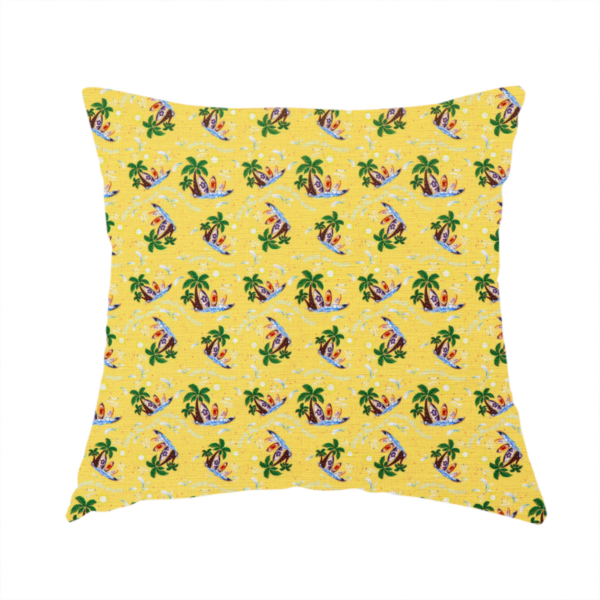 The fabric used to create this handmade cushion is a yellow summer-themed fabric featuring a repeating pattern of palm trees, surfboards, and waves.