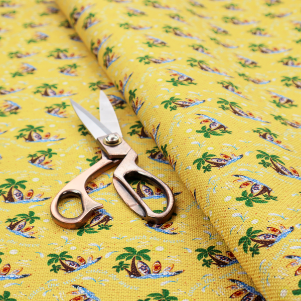 Yellow summer-themed fabric featuring a repeating pattern of palm trees, surfboards, and waves.