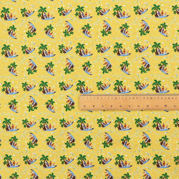 Yellow summer-themed fabric featuring a repeating pattern of palm trees, surfboards, and waves.
