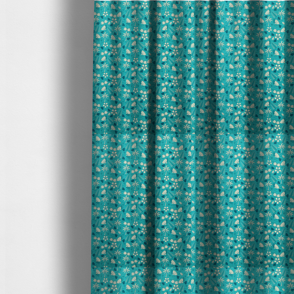 The fabric used to create these made-to-measure curtains is a teal summer-themed fabric featuring a repeating pattern of palm trees, seashells, flowers, and tropical foliage.