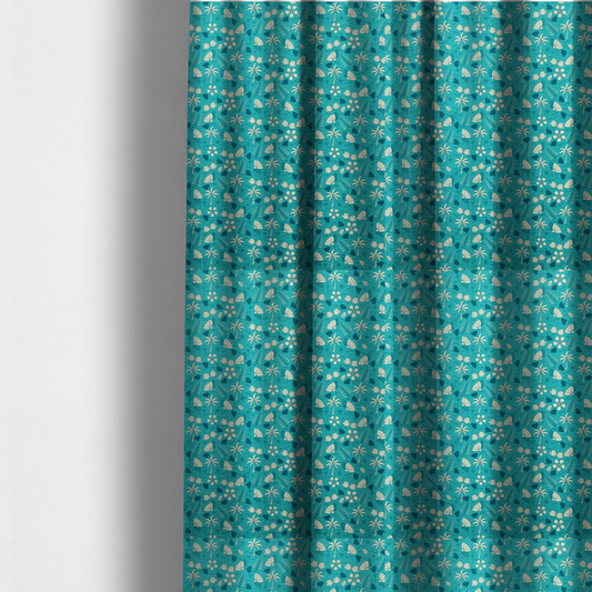 The fabric used to create these made-to-measure curtains is a teal summer-themed fabric featuring a repeating pattern of palm trees, seashells, flowers, and tropical foliage.