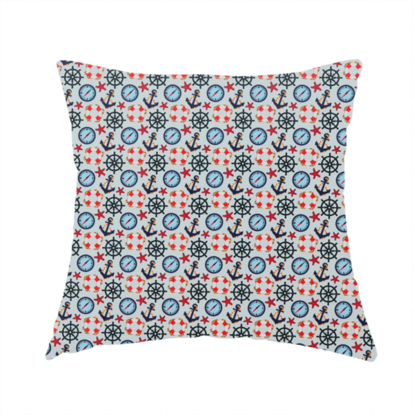 The fabric used to create this handmade cushion is a light blue fabric with a dense repeating nautical pattern featuring dark blue anchors, black ship wheels, blue compasses, red-and-white lifebuoys, and tiny red stars.