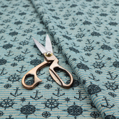 Nautical-themed repeating pattern featuring dark blue anchors, ship wheels, compass roses, and stars over a light blue and dark blue striped background.
