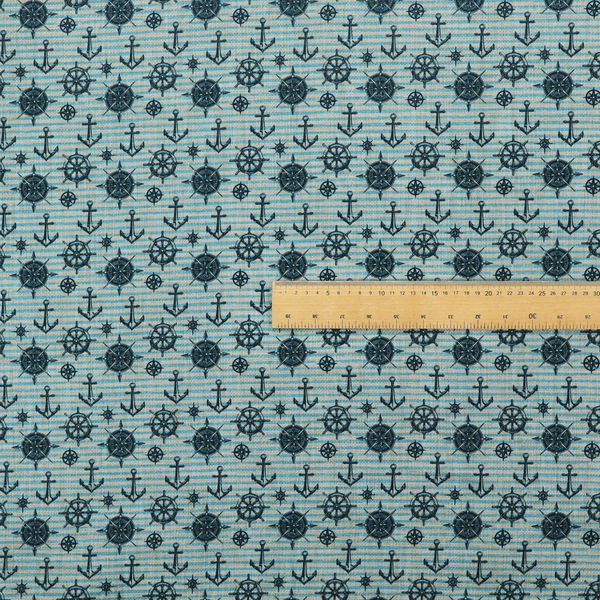 Nautical-themed repeating pattern featuring dark blue anchors, ship wheels, compass roses, and stars over a light blue and dark blue striped background.