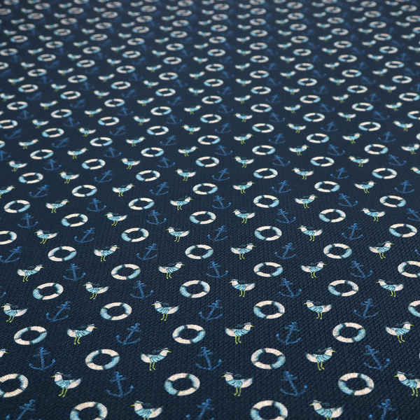 Nautical-themed repeating pattern featuring seagulls, anchors, and life rings set against a dark blue background.