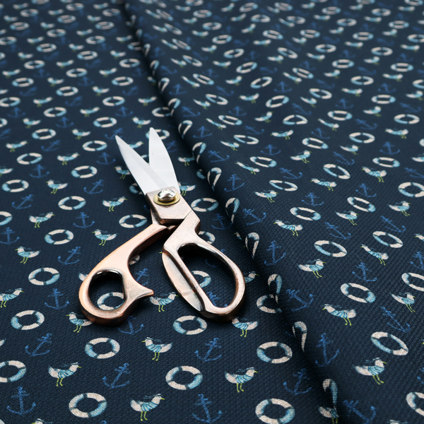 Nautical-themed repeating pattern featuring seagulls, anchors, and life rings set against a dark blue background.