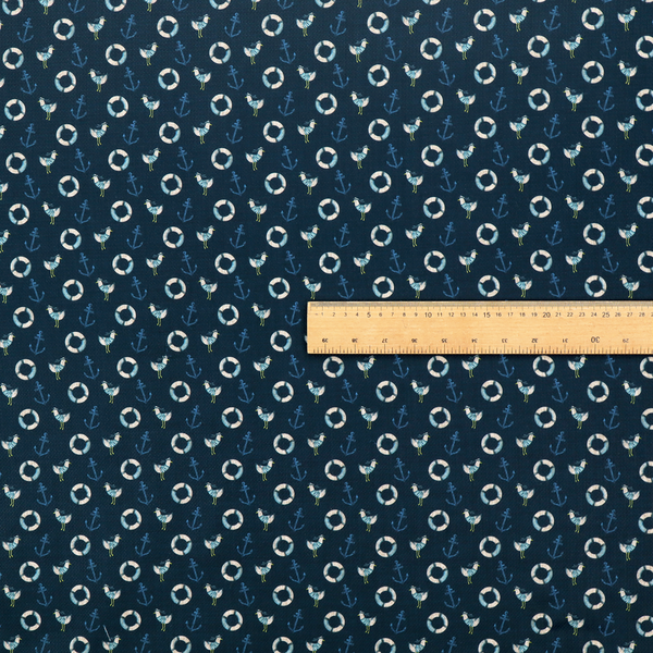 Nautical-themed repeating pattern featuring seagulls, anchors, and life rings set against a dark blue background.
