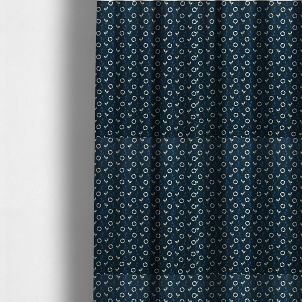 The fabric used to create these made-to-measure curtains is a nautical-themed repeating pattern featuring seagulls, anchors, and life rings set against a dark blue background.