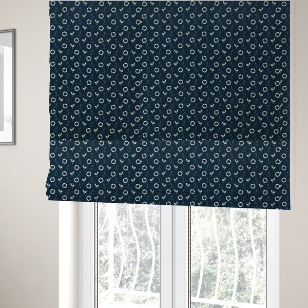 The fabric used to create these Roman blinds is a nautical-themed repeating pattern featuring seagulls, anchors, and life rings set against a dark blue background.