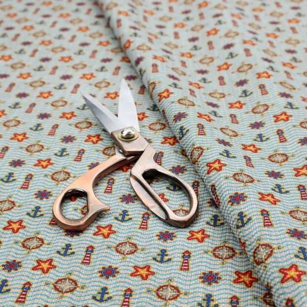 Nautical-themed repeating pattern featuring lighthouses, anchors, compass stars, and starfish over a wavy-lined background.