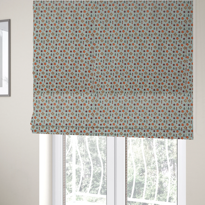 The fabric used to create these Roman blinds is a nautical-themed repeating pattern featuring lighthouses, anchors, compass stars, and starfish over a wavy-lined background.