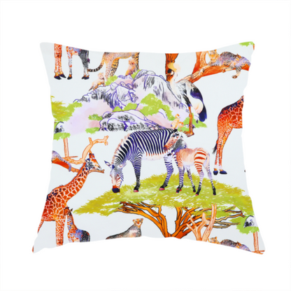 The fabric used to create this handmade cushion is featuring a vibrant African savanna landscape with giraffes, zebras, cheetahs, and birds among acacia trees and rocky terrain.
