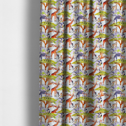 The fabric used to create these made-to-measure curtains is featuring a vibrant African savanna landscape with giraffes, zebras, cheetahs, and birds among acacia trees and rocky terrain.