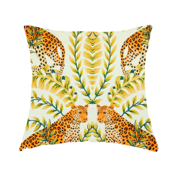 the fabric used to create this handmade cushion is a symmetrical design of spotted leopards surrounded by golden and green tropical foliage and palm leaves.