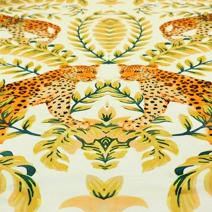 Fabric pattern featuring a symmetrical design of spotted leopards surrounded by golden and green tropical foliage and palm leaves.
