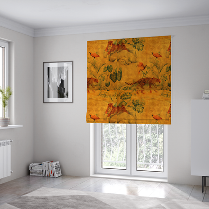 The fabric used to create these Roman blinds is a warm orange and gold background with jungle wildlife, including leopards, tropical birds, large green leaves, and rocky terrain.