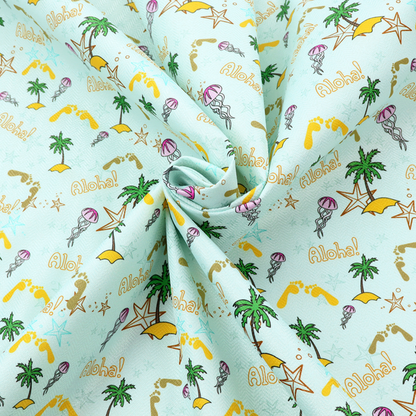 Tropical-themed pattern fabric with palm trees, jellyfish, and 'Aloha!' text on a light blue background.