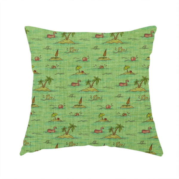 The fabric used to create this handmade cushion is a green fabric with a repeating beach pattern featuring islands, palm trees, and beach balls.
