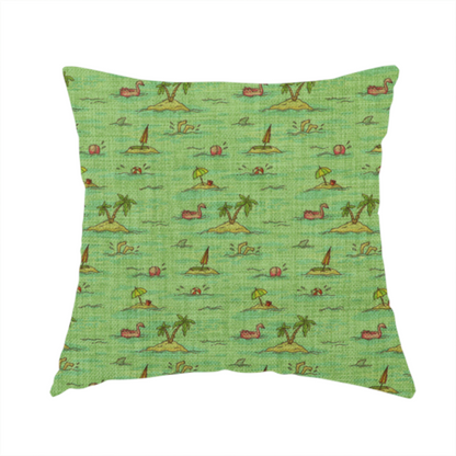 The fabric used to create this handmade cushion is a green fabric with a repeating beach pattern featuring islands, palm trees, and beach balls.