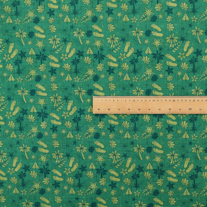 A repeating tropical-themed pattern on textured teal fabric featuring yellow-green flip-flops, seashells, starfish, and tiny palm trees.