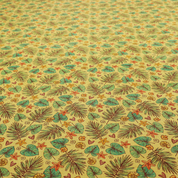 A dense, repeating tropical print on a yellow background featuring green palm fronds, heart-shaped leaves, orange starfish, and tiny sea shells.