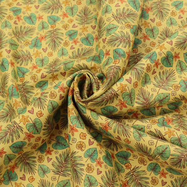 A dense, repeating tropical print on a yellow background featuring green palm fronds, heart-shaped leaves, orange starfish, and tiny sea shells.